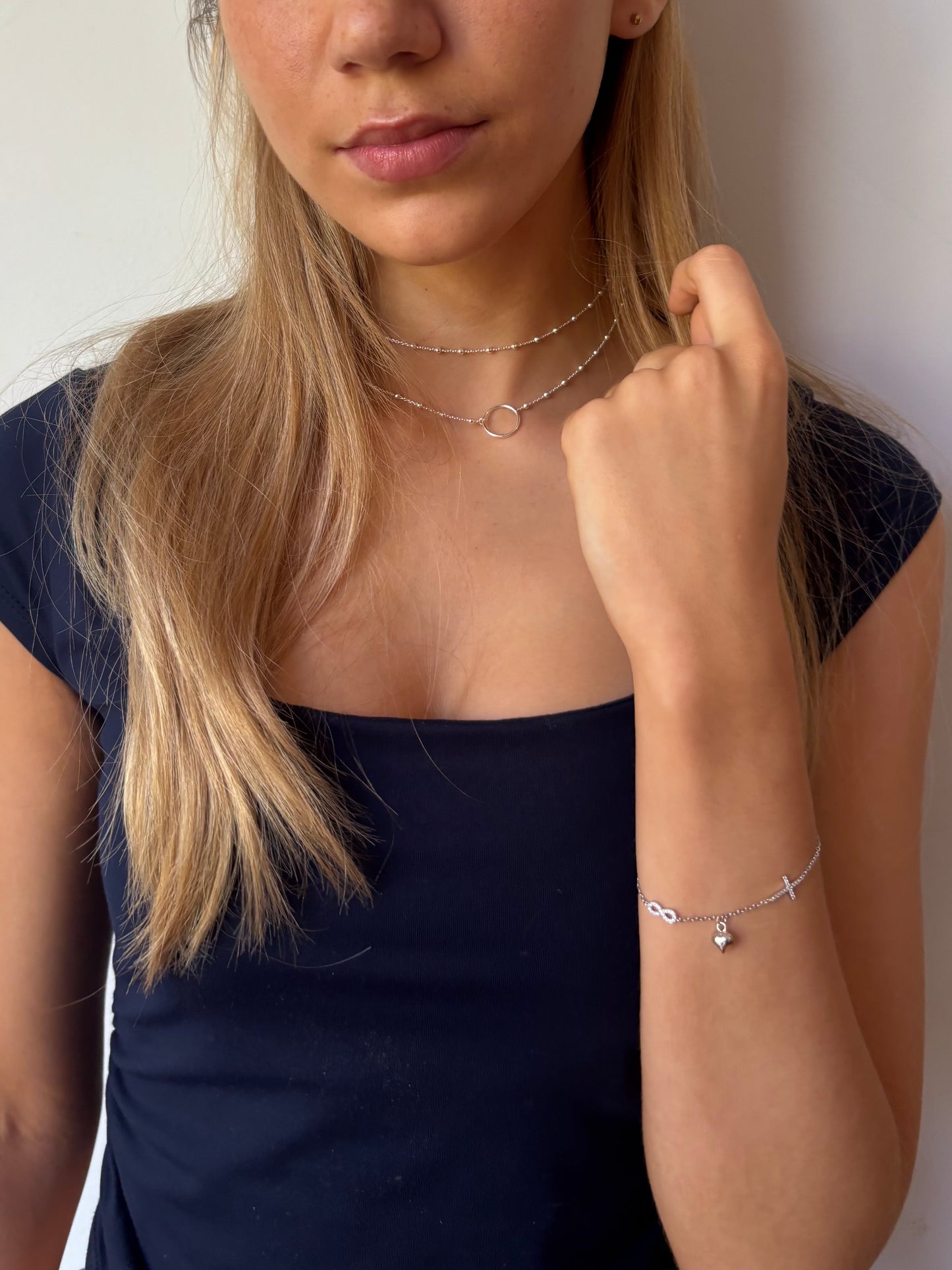 Sterling Silver Adjustable Charm Bracelet featuring a Cross, Heart and Infinity Symbol with CZ Simulated Diamonds